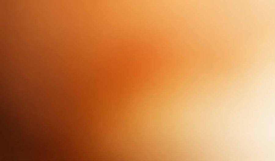 Three generations of family enjoying a meal together outdoors